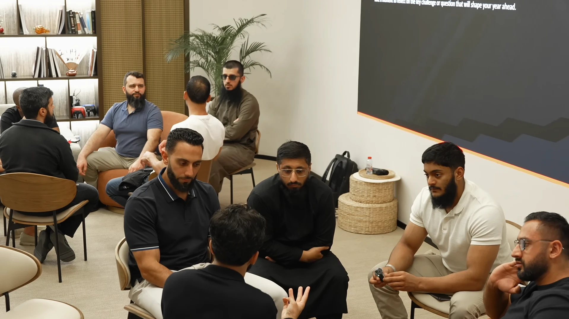 Members of The Cave Network gathered in a private meeting room in Dubai